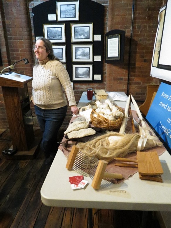 Zoë Lawson with display table 2/19/2023