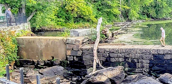 Entrance to 1828 fishway blocked by concrete.