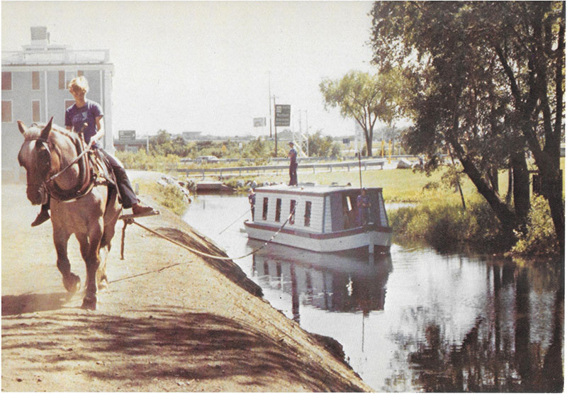 replica canal boat in Middlesex Canal in Woburn